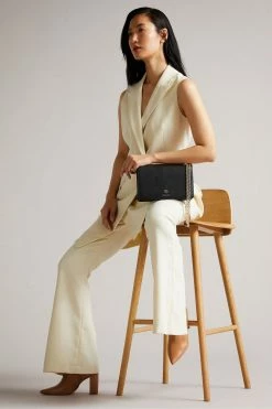 Ted Baker Black Jorjey Flower Eyelet Cross Body Bag 11 Ted Baker Black Jorjey Flower Eyelet Cross Body Bag -TED BAKER Sales Store unnamed file 25